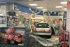 Car ends up in shop after driver loses control on forecourt