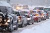 Snow closes much of UK but forecourts remain open