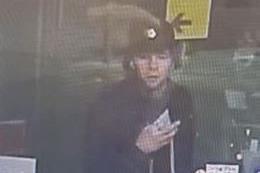Police release CCTV image after man smashes service window with metal ...