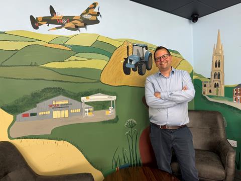 Tom and mural