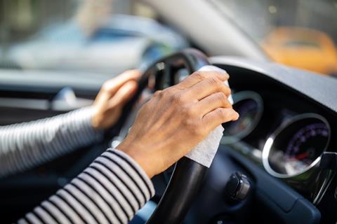 Getty cleaning steering wheel
