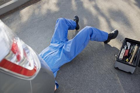 Car servicing workshop GettyImages-90201046