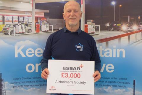 David Ellis presents £3,000 donation to Alzheimer's Society as part of Let's Give safety initiative at Stanlow Refinery