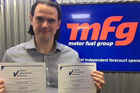 Peter Lund, MFG HSSE manager, with ISO certificates