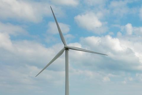 field farming tractor wind turbines